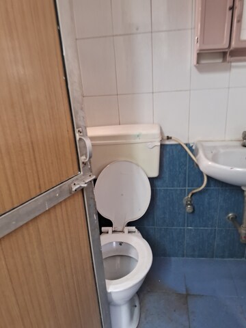 Bathroom in 2 BHK Apartment at Naam CHS , Kopar Khairane – for Rent