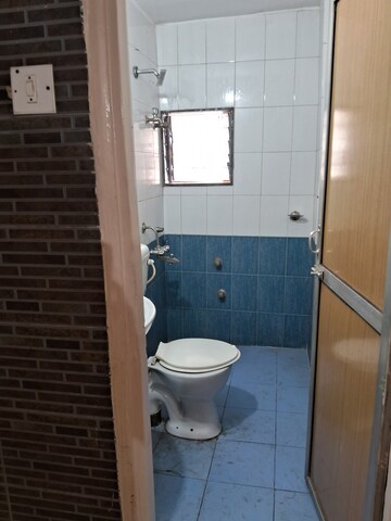 Bathroom in 2 BHK Apartment at Naam CHS , Kopar Khairane – for Rent