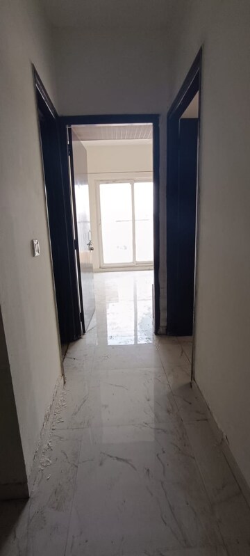 Building Lobby in 2 BHK Apartment at Pivotal Riddhi Siddhi, Sector 99 – for Rent