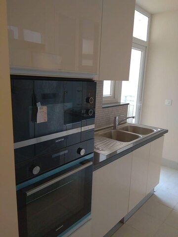 Kitchen in 3.5 BHK Apartment at DLF The Ultima, Sector 81 – for Rent