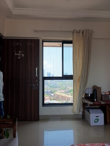 Living Room in 1 BHK Apartment at Ajmera Serene, Dadar East – for Sale