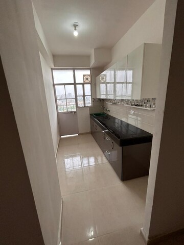 Kitchen in 2 BHK Apartment at Signature Global Solera 2, Sector 107 – for Rent