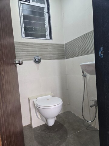 Bathroom in 1 BHK Apartment at JVM Veda, Kasarvadavali – for Rent