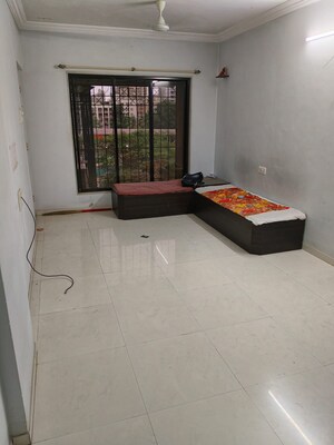 Living Room in 2 BHK Apartment at Krishna Nagari CHS Borivali, Borivali West – for Sale