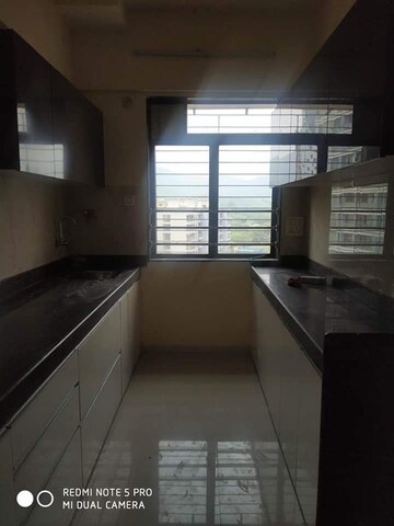 Kitchen in 2 BHK Apartment at Satguru Solitaire, Kasarvadavali – for Rent