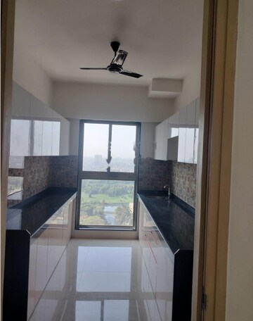Kitchen in 4 BHK Apartment at Raj Infinia, Malad West – for Rent