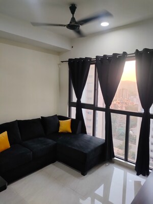 Living Room in 1 BHK Apartment at Lodha Crown Quality Homes, Majiwada – for Sale