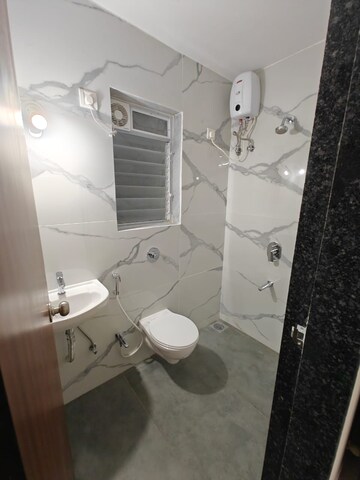 Bathroom in 1 BHK Apartment at Raunak Bliss, Ghodbunder Road – for Rent