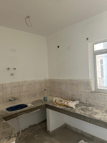 Kitchen in 2 BHK Apartment at ATS Allure, Sector 22d Yamuna Expressway – for Sale