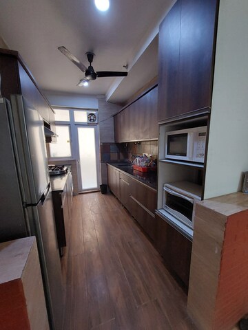 Kitchen in 3 BHK Apartment at Wave Amore, Sector 32 – for Rent