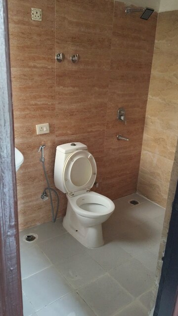 Bathroom in 3 BHK Apartment at Aims Golf Avenue I, Sector 75 – for Rent