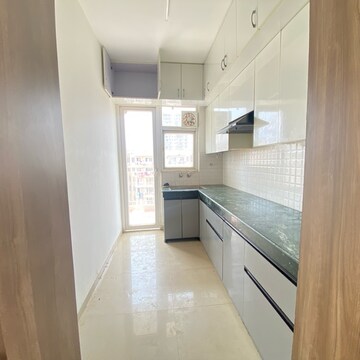 Kitchen in 2 BHK Apartment at Shree Vardhman Green Court, Sector 90 – for Sale