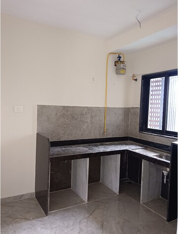 Kitchen in 2 BHK Apartment at Ajmera Boulevard, Malad West – for Rent