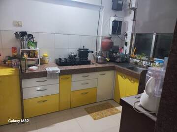 Kitchen in 2 BHK Apartment at Cosmos Lounge, Manpada – for Rent