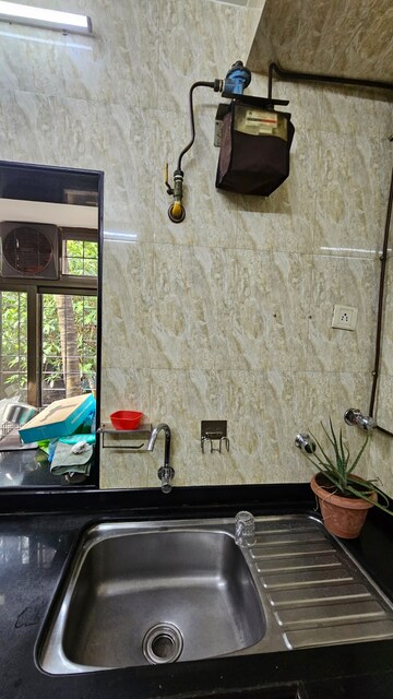 Furnished Amenities in 2 BHK Apartment at Vijaynagar Society, Marol – for Rent