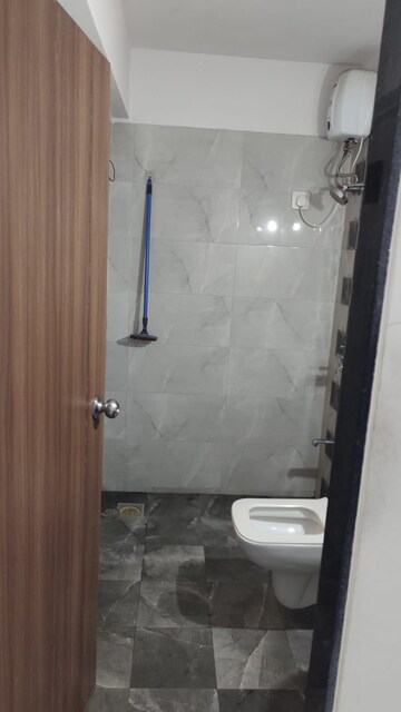 Bathroom in 2 BHK Apartment at Cosmos Lounge, Manpada – for Rent