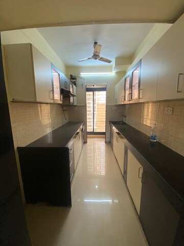 Kitchen in 1 BHK Apartment at Raunak Heights, Ghodbunder Road – for Rent