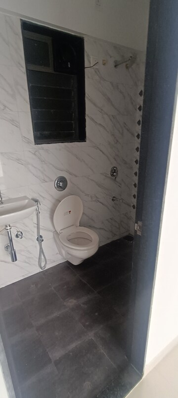 Bathroom in 1 BHK Apartment at UK Iridium, Kandivali East – for Rent