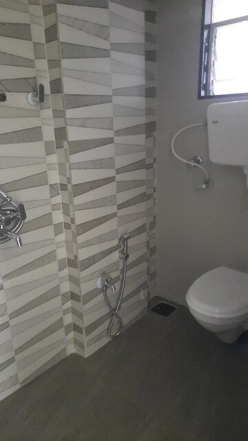 Bathroom in 1 BHK Apartment at Swagat Heights, Mira Road – for Rent