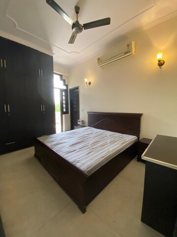 Bedroom in 3 BHK Builder Floor at Nehru Enclave – for Rent
