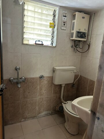 Bathroom in 1 BHK Apartment at Dedhia Harshgiri, Dahisar East – for Sale