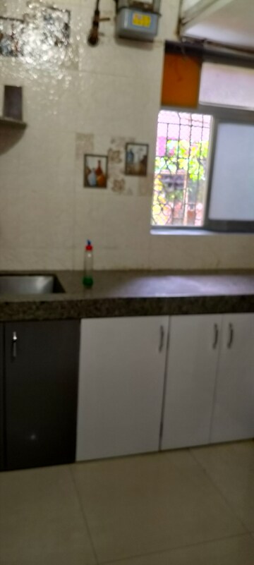Kitchen in 1 BHK Apartment at Suryodaya Apartments, Seawoods Sector 48 – for Rent