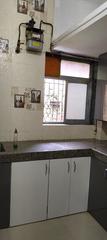 Kitchen in 1 BHK Apartment at Suryodaya Apartments, Seawoods Sector 48 – for Rent