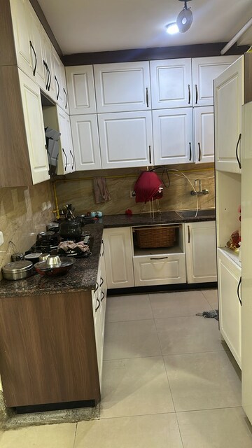 Kitchen in 3 BHK Apartment at Aditya City Apartments, Shahpur Bamheta – for Sale