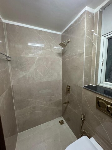 Bathroom in 3 BHK Apartment at Smart World Orchard, Sector 61 – for Rent