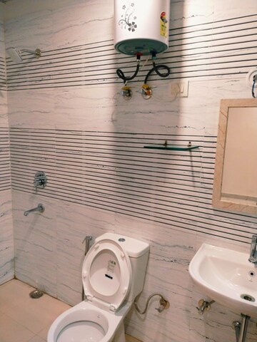 Bathroom in 3 BHK Builder Floor at DLF Star Mall, Sector 30 – for Rent