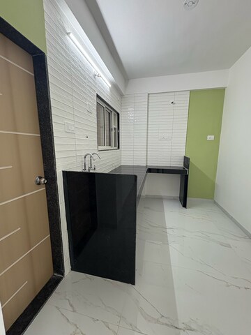 Kitchen in 1 BHK Apartment at Wadgaon Sheri – for Sale