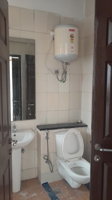 Bathroom in 3 BHK Apartment at Unitech Harmony, Sector 50 – for Rent