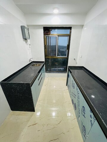 Kitchen in 2 BHK Apartment at Neminath Nemi Bhavan, Goregaon West – for Rent