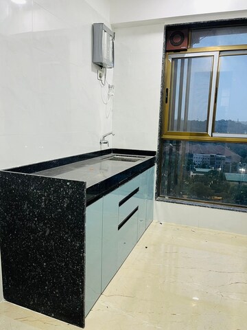 Kitchen in 2 BHK Apartment at Neminath Nemi Bhavan, Goregaon West – for Rent