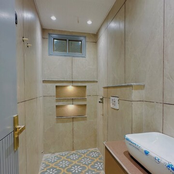 Bathroom in 3 BHK Builder Floor at Mohan Garden – for Sale