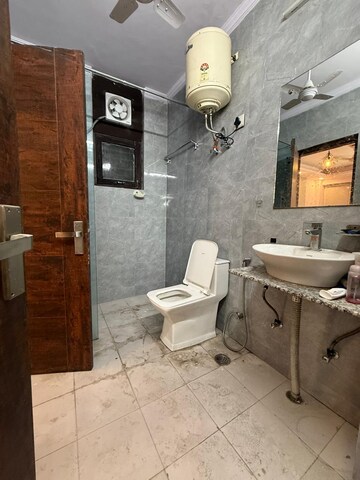 Bathroom in 3 BHK Builder Floor at Greater Kailash I – for Rent