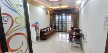 Living Room in 1 BHK Apartment at Raunak Heights, Ghodbunder Road – for Rent