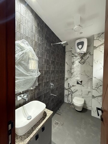 Bathroom in 2 BHK Builder Floor at Kalkaji – for Rent