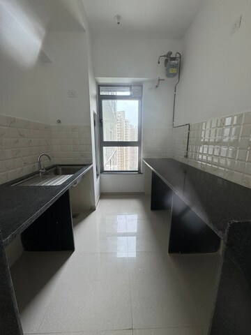 Kitchen in 3 BHK Apartment at Kalpataru Immensa, Kolshet Road – for Rent