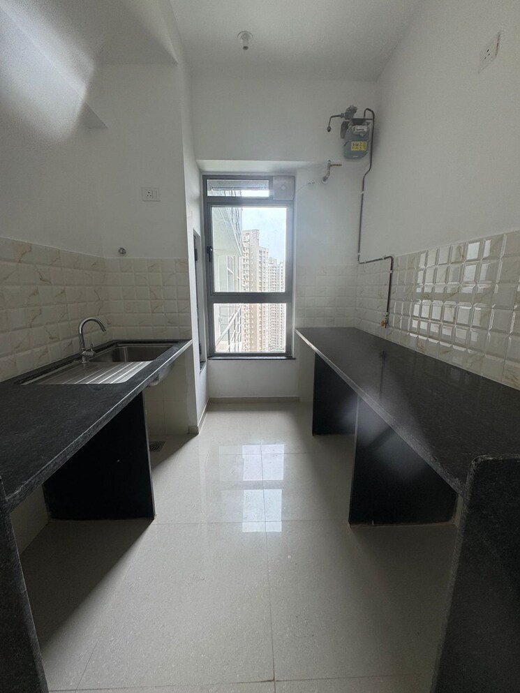 Kitchen, kalpataru-immensa 3 Bedroom 944 Sq.Ft. Apartment In Kolshet Road Thane 8920767