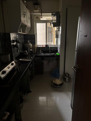 Kitchen in 2 BHK Apartment at Lodha Amara, Kolshet Road – for Sale