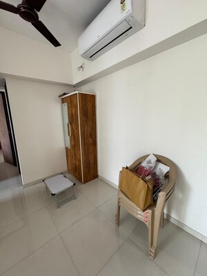 Living Room in 1 BHK Apartment at Lodha Amara, Kolshet Road – for Sale