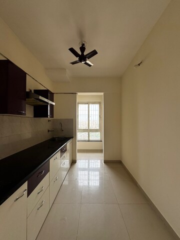 Kitchen in 2 BHK Apartment at PuranikCity Building No D1 D2 & H Chs Ltd, Ghodbunder Road – for Rent