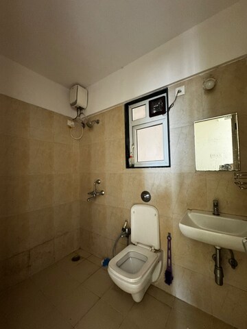 Bathroom in 2 BHK Apartment at PuranikCity Building No D1 D2 & H Chs Ltd, Ghodbunder Road – for Rent