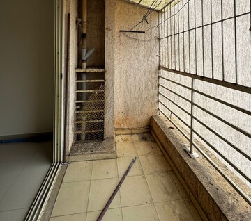 Balcony in 2 BHK Apartment at PuranikCity Building No D1 D2 & H Chs Ltd, Ghodbunder Road – for Rent