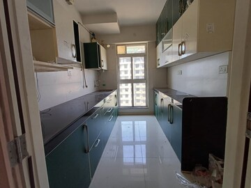 Kitchen in 2 BHK Apartment at Godrej Emerald, Ghodbunder Road – for Rent