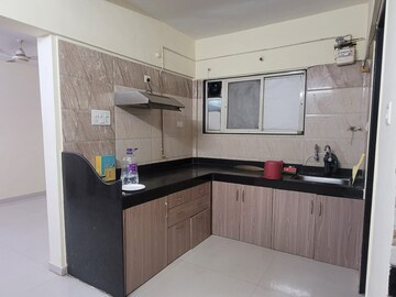 Kitchen in 2 BHK Apartment at GK Royale Rahadki Greens, Rahatani – for Rent