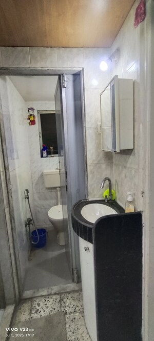 Bathroom in 2 BHK Apartment at Chitravani Chs, Malad East – for Sale