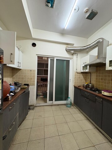 Kitchen in 2 BHK Apartment at Mahagun Moderne, Sector 78 – for Sale