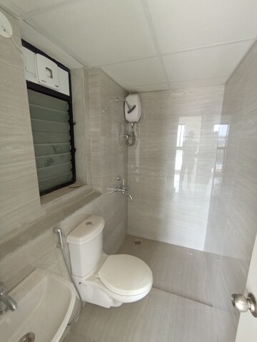 Bathroom in 2 BHK Apartment at Runwal Gardens Phase I, Dombivli East – for Sale